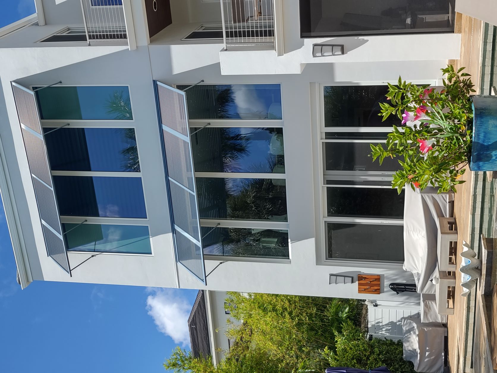 Modern Bahama Shutters — Coastal Home