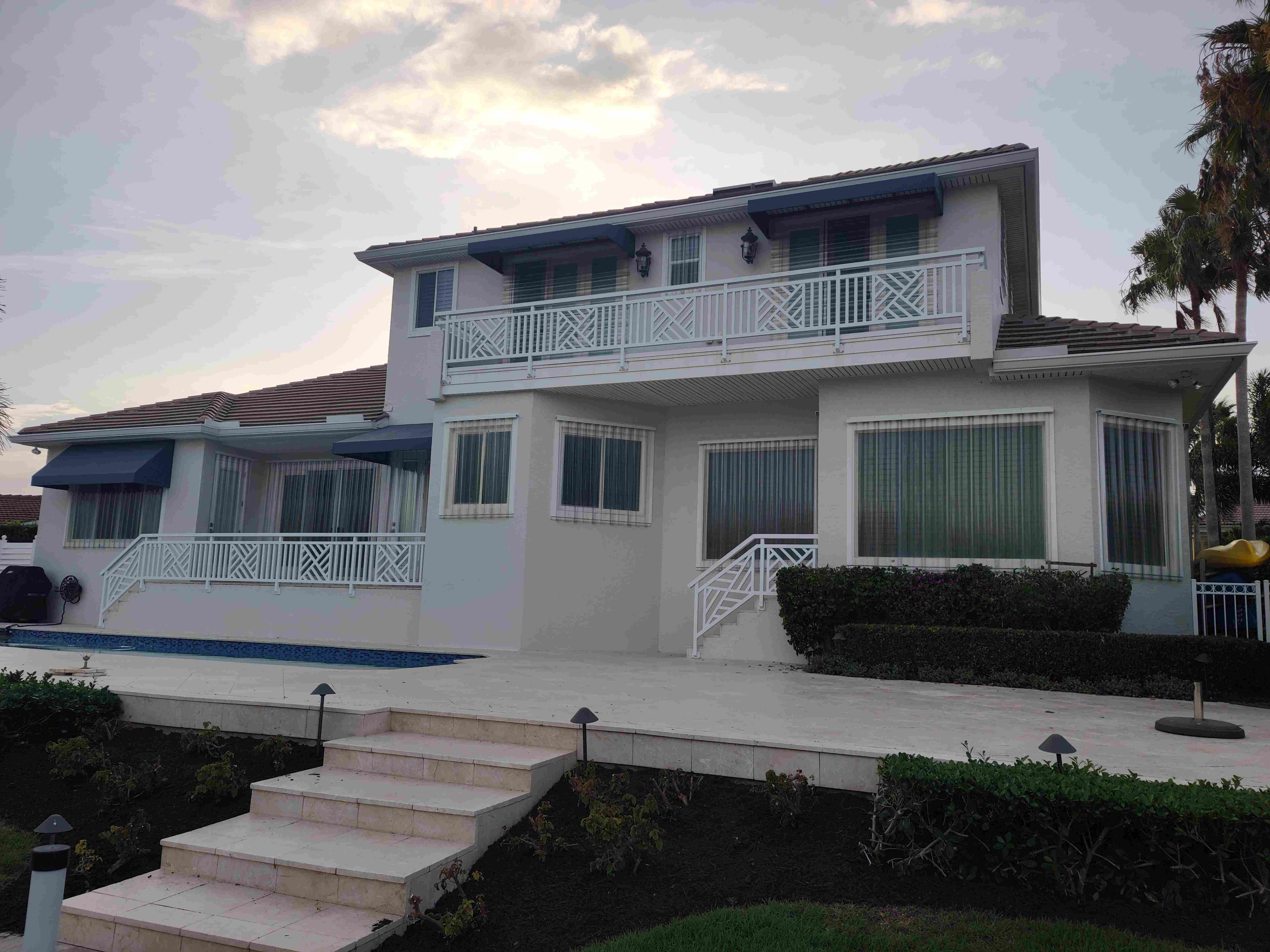 Waterfront Home — Blue Bahama Shutters